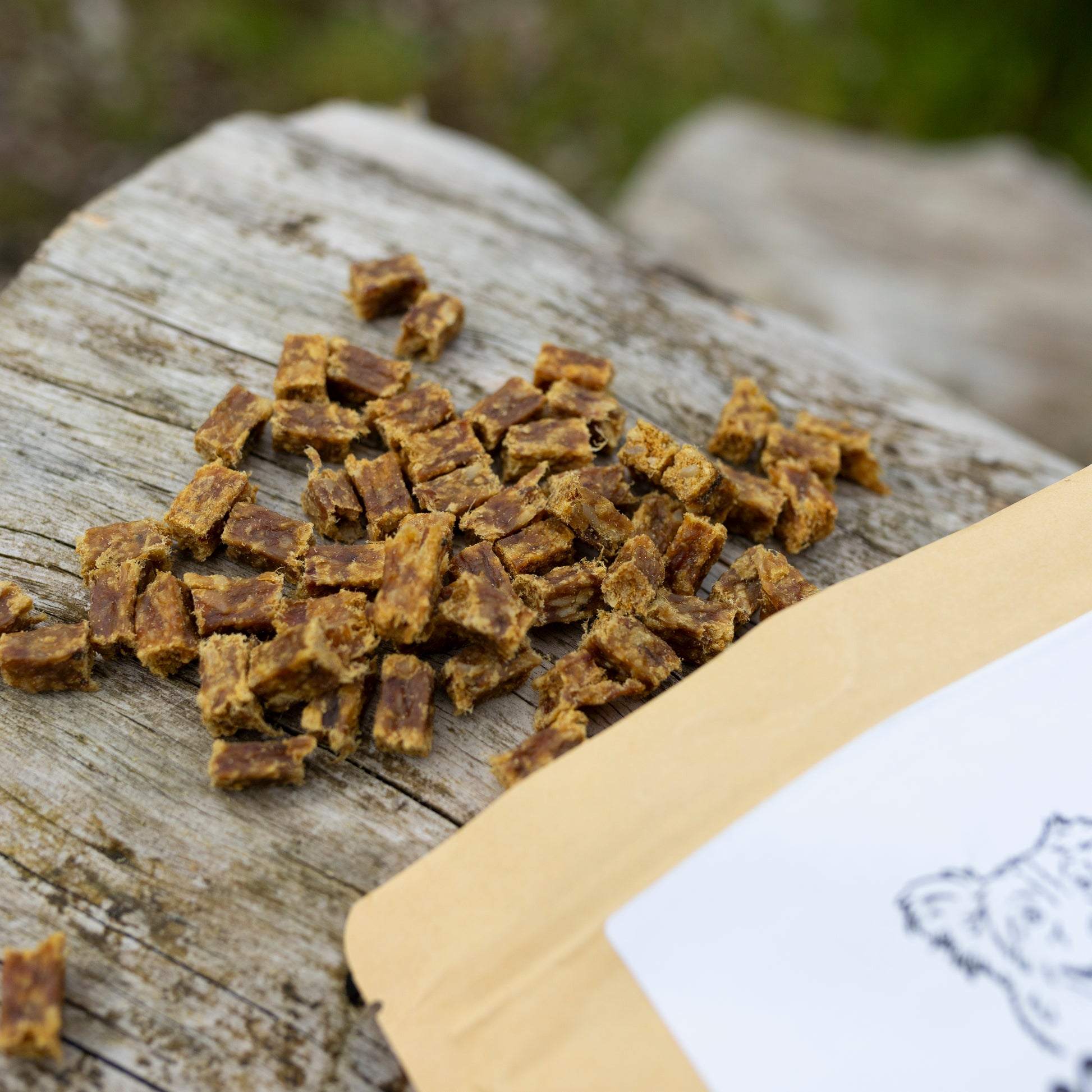 Mabel's Natural Pet Supplies training treats in 100g and 250g packs, small, healthy treats for dogs, shown in the image.