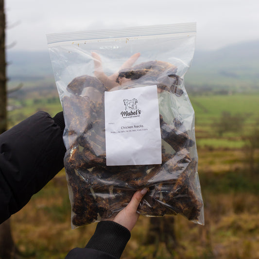 Mabel's Natural Pet Supplies chicken necks in a 1kg or 500g bulk bag for pet treats or feeding.