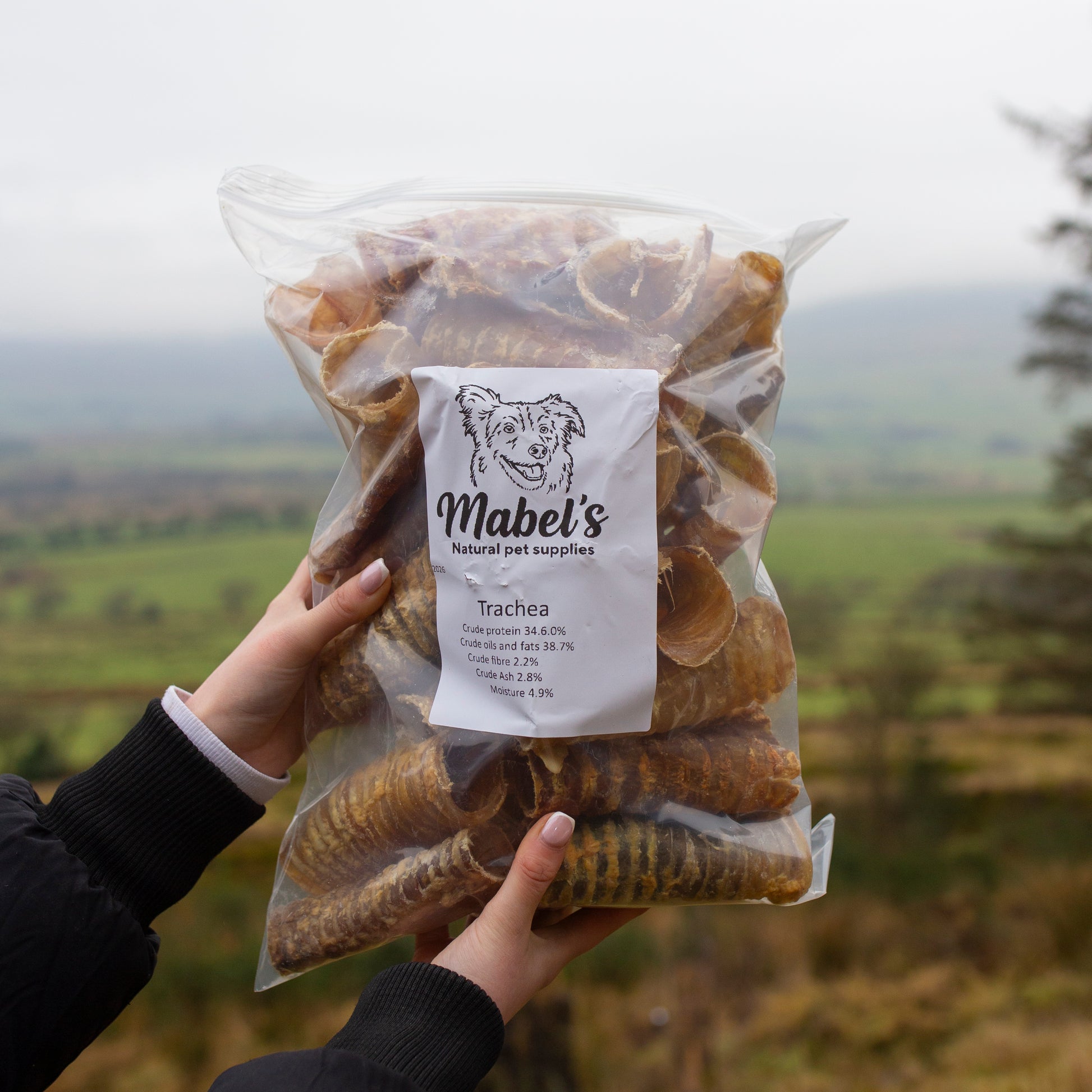 Mabel's Natural Pet Supplies beef trachea dog treats in 1kg and 500g sizes, natural chews for dogs, shown in the image.